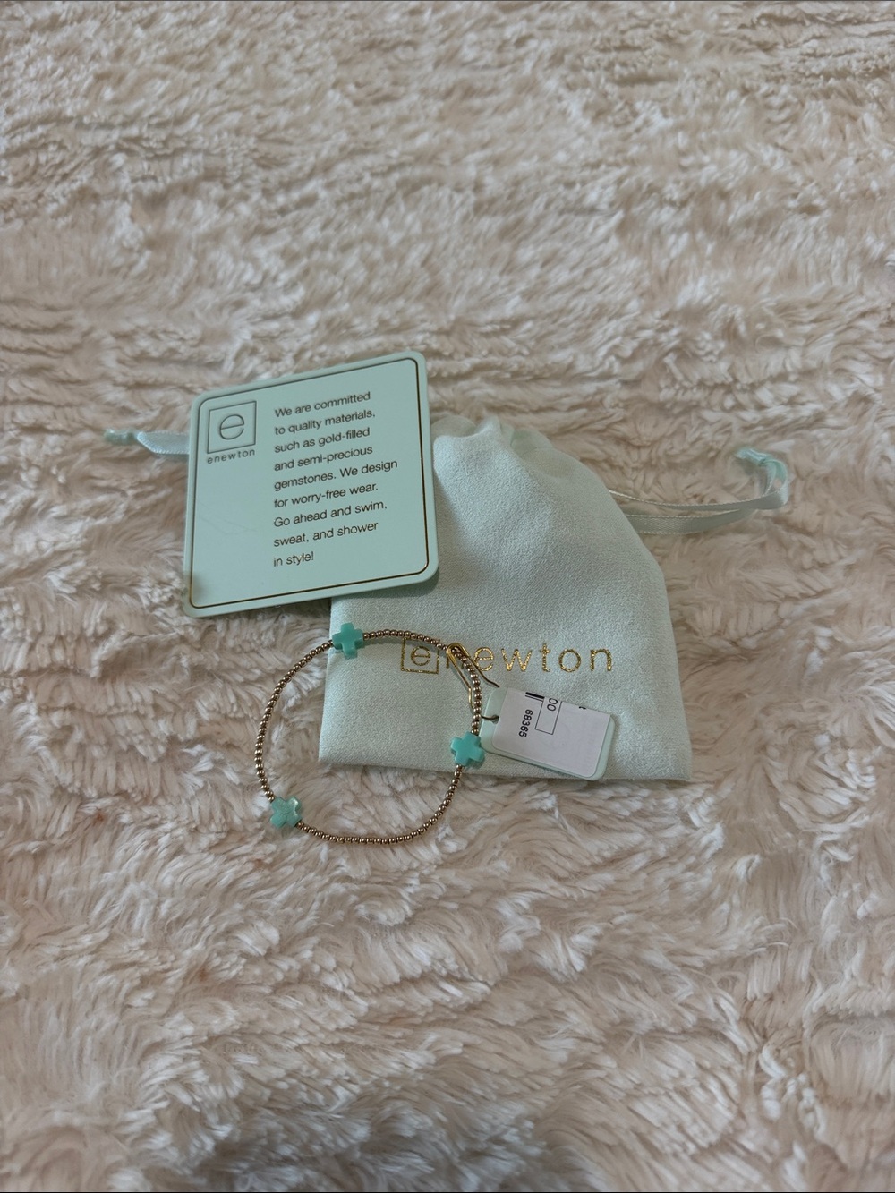 enewton signature cross bracelet: gold and teal